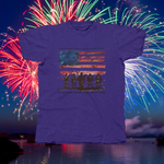 Load image into Gallery viewer, AMERICAN FLAG WITH SOLDIERS LAND OF THE FREE BECAUSE OF THE BRAVE- front of tee
